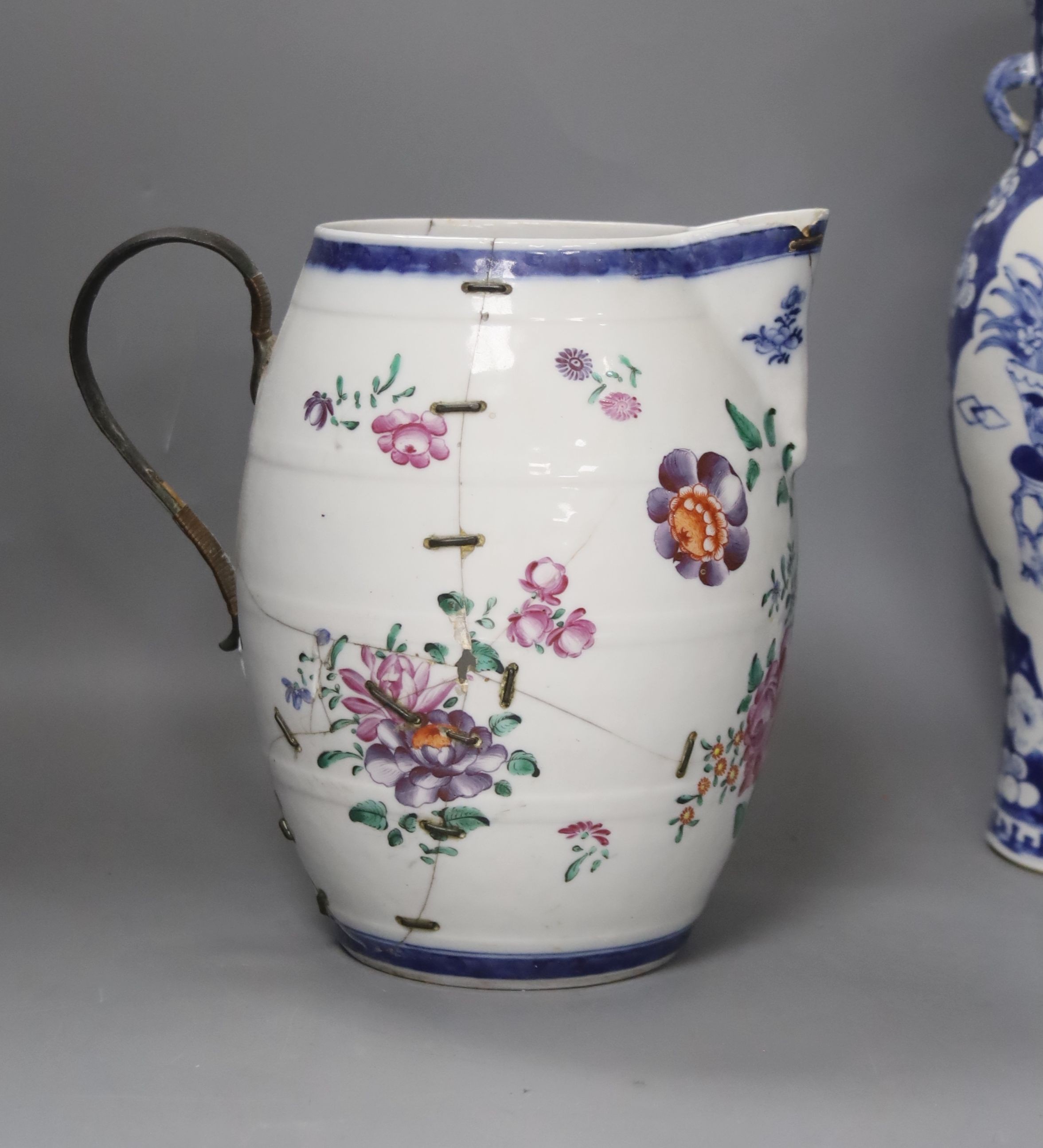 A Chinese Jiaqing export porcelain toilet jug and basin, a small punch bowl, and a blue and white vase (all a.f.) 31cm